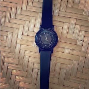 super cute small black casio watch.